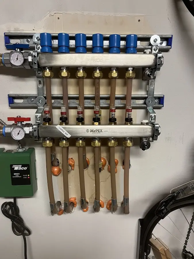 Plumber performing Water Heater Repair at a residential property in Fort Washington